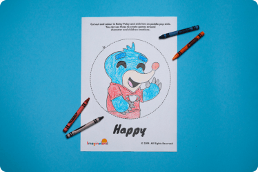 Colouring in picture of Roley Poly with crayons.